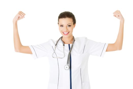 Attractive young nurse with raised hands. Isolated on white.