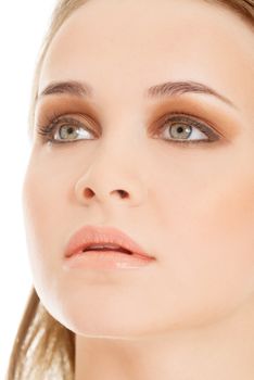 Attractive woman's portrait. Closeup. She's looking up. Isolated on white.