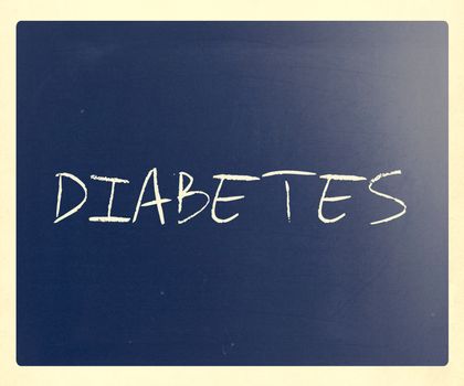 The word "Diabetes" handwritten with white chalk on a blackboard.