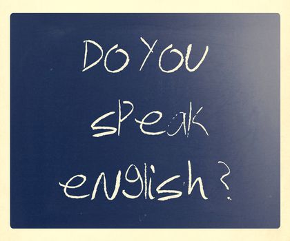 "Do you speak english" handwritten with white chalk on a blackboard.