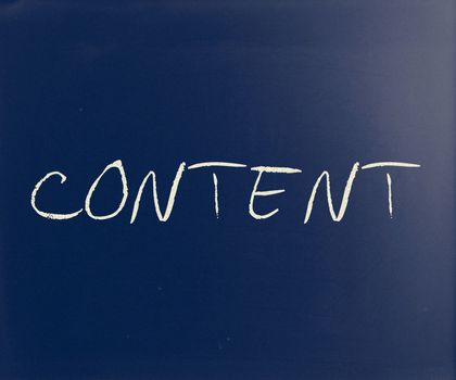 "Content" handwritten with white chalk on a blackboard.