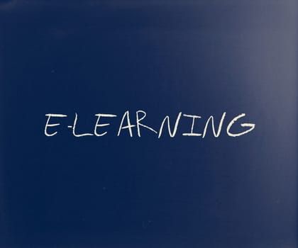 "E-learning" handwritten with white chalk on a blackboard.