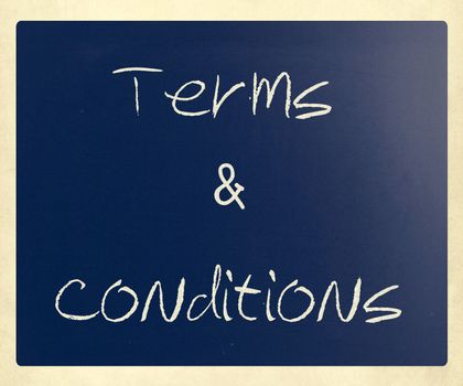 "Terms & Conditions" handwritten with white chalk on a blackboard.