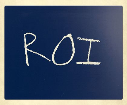 The word "ROI" handwritten with white chalk on a blackboard.