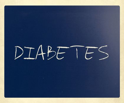 The word "Diabetes" handwritten with white chalk on a blackboard.