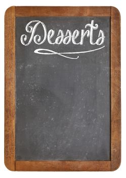 desserts - vintage slate blackboard in wood frame  with white chalk smudges used a restaurant menu