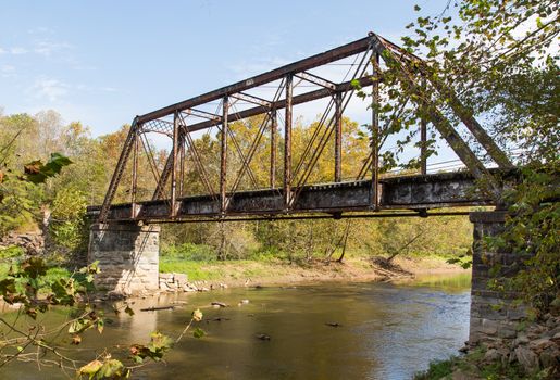 This old, unused railroad trestle crosses the Valley River in North Carolina.