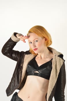 pretty red head in flying jacket saluting