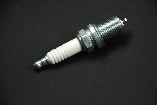 stock pictures of a sparkplug for a lawnmower