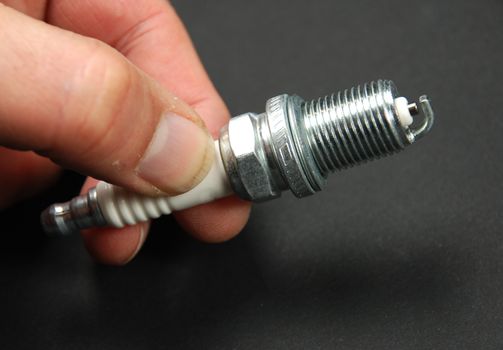 stock pictures of a sparkplug for a lawnmower