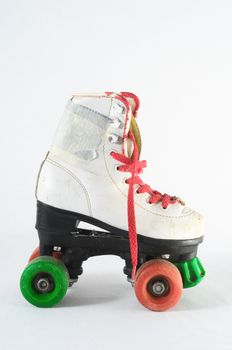Used Vintage Consumed Roller Skate on a White Background