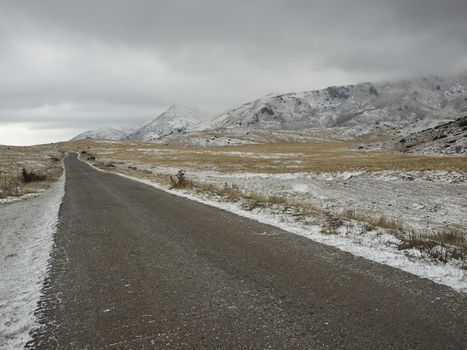 First snow on the road to Galicnik       
