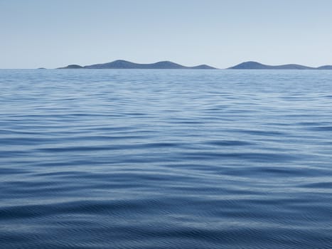 Textures of ripples and islands in background    