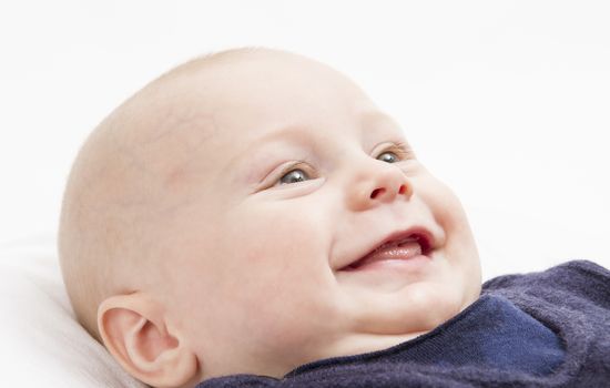 12 week old toddler smiling in horizontal image