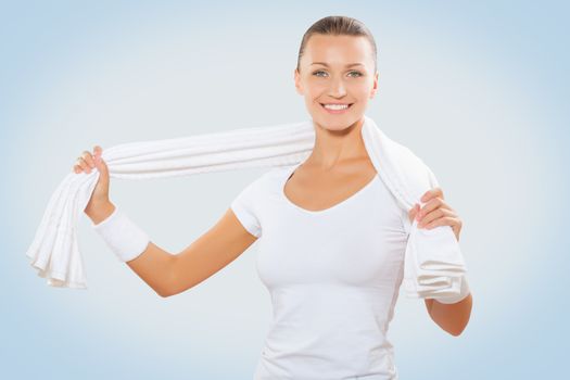 beautiful sports female holding white cooton towel