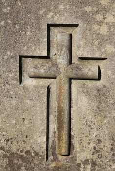 Cross on stone background