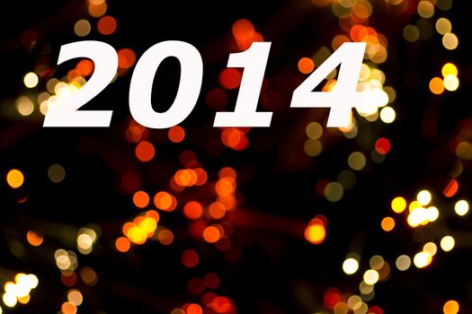 Happy new year 2014 message over luminous background