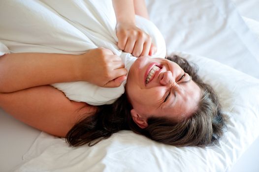 girl in bed in a good mood in the morning