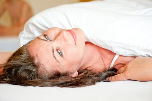 beautiful girl on the bed in the morning serene vulnerable