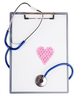 Blank sheet and stethoscope over white background