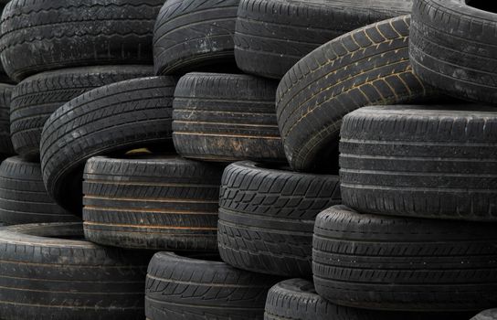 Pile of old rubber tires for background