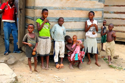 Uganda - 6 March: Ugandan children standing at the wall of the house in the village of 6 March 2012 Uganda.