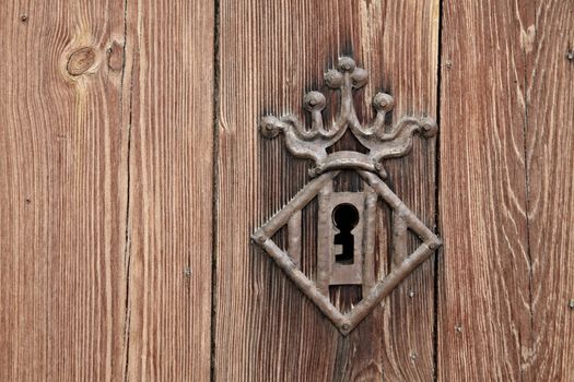 Old wooden gate lock closeup