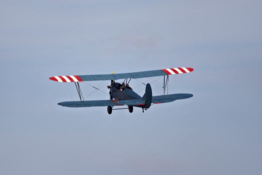 Old airplane against blue sky