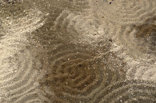 full frame abstract pattern with circles in multicolored sand