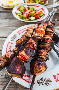 Shish kebabs on skewers on a plate