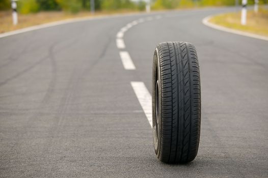 Wheel of a car on a road