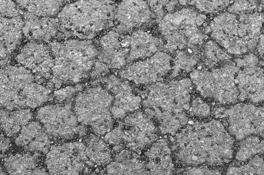 black  background with shale and sandstone  on sidewalk  , abstract wallpaper