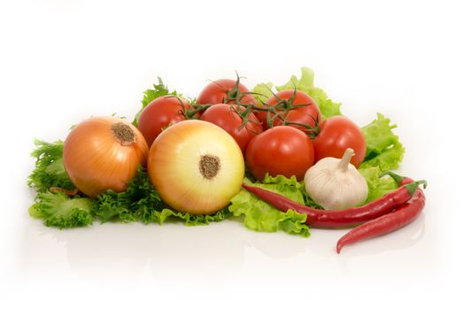 Fresh green salad lettuce, onion, garlic,chilli pepper, tomatoes