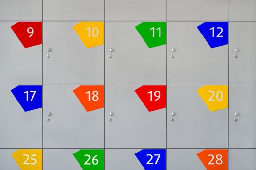 Numbered colored cells intended for hand luggage in a public place.