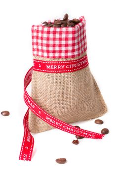 closed sack bag with red bow isolated on white background