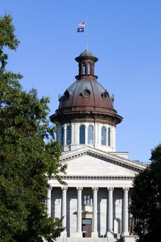 South Carolina state capital building in Columbia, SC against a blue sky.