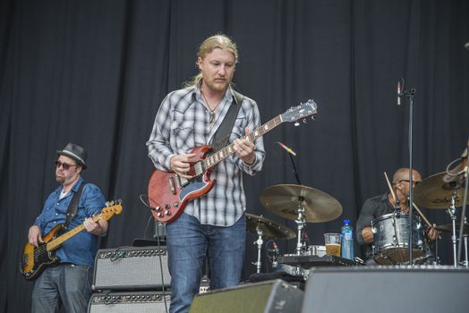 Each year the first week in August held a blues festival in Notodden, Norway. Photo is shot from the concert with Tedeschi Trucks Band. The band members are: Susan Tedeschi ��� lead vocals, rhythm guitar. Derek Trucks ��� lead guitar. Kofi Burbridge ��� keyboards, flute. Tyler Greenwell ��� drums, percussion. J. J. Johnson ��� drums, percussion. Kebbi Williams ��� saxophone. Maurice Brown ��� trumpet. Saunders Sermons ��� trombone. Mike Mattison ��� harmony vocals. Mark Rivers ��� harmony vocals.