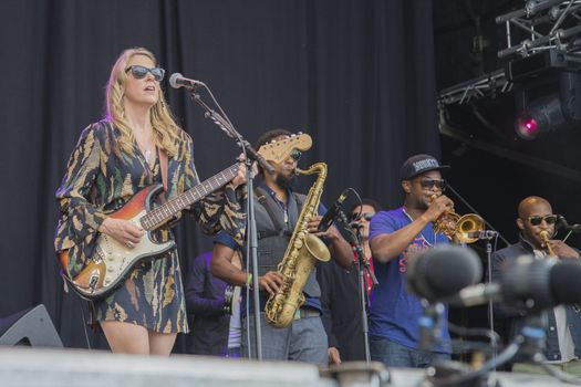 Each year the first week in August held a blues festival in Notodden, Norway. Photo is shot from the concert with Tedeschi Trucks Band. The band members are: Susan Tedeschi ��� lead vocals, rhythm guitar. Derek Trucks ��� lead guitar. Kofi Burbridge ��� keyboards, flute. Tyler Greenwell ��� drums, percussion. J. J. Johnson ��� drums, percussion. Kebbi Williams ��� saxophone. Maurice Brown ��� trumpet. Saunders Sermons ��� trombone. Mike Mattison ��� harmony vocals. Mark Rivers ��� harmony vocals.