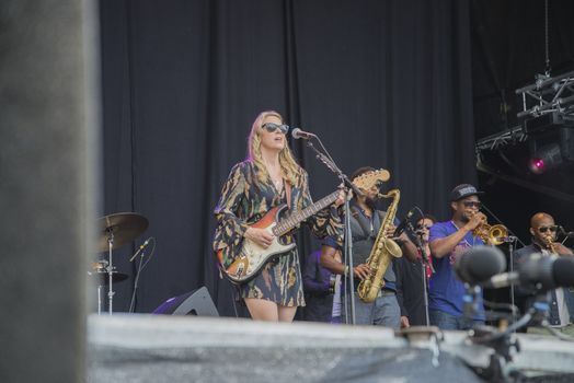 Each year the first week in August held a blues festival in Notodden, Norway. Photo is shot from the concert with Tedeschi Trucks Band. The band members are: Susan Tedeschi ��� lead vocals, rhythm guitar. Derek Trucks ��� lead guitar. Kofi Burbridge ��� keyboards, flute. Tyler Greenwell ��� drums, percussion. J. J. Johnson ��� drums, percussion. Kebbi Williams ��� saxophone. Maurice Brown ��� trumpet. Saunders Sermons ��� trombone. Mike Mattison ��� harmony vocals. Mark Rivers ��� harmony vocals.