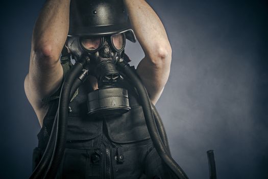 Radiation, nuclear disaster, man with gas mask, protection