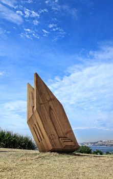 Bondi, Australia - November 3,  2013: Sculpture By The Sea, Bondi 2013. Annual cultural event that showcases artists from around the world  Sculpture titled 'Sacred Space' by Dale Miles NSW).  Medium - timber, steel, tung oil  $20000