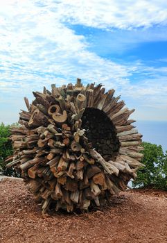 Bondi, Australia - November 3,  2013: Sculpture By The Sea,2013. Annual cultural event that showcases artists from around the world  Sculpture titled Husk' by Marcus Tatton (TAS).  Medium - galvanised steel, driftwood.  $25000