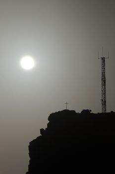 Some Silhouetted Antennas on the top of a Hill