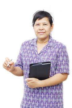 senior smiling woman holding pen and notebook