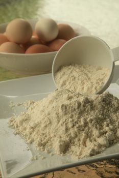 Baking Flour in Outdoor Setting with Eggs