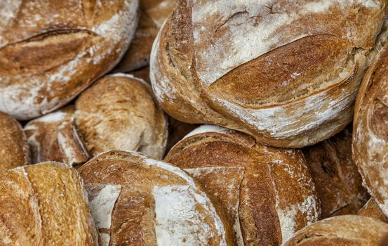 Close-up image of a heap of fresh French campaign breads