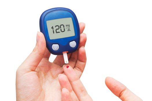 Woman doing blood sugar test