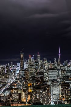 Full view of downtown Toronto at night with glamour lights