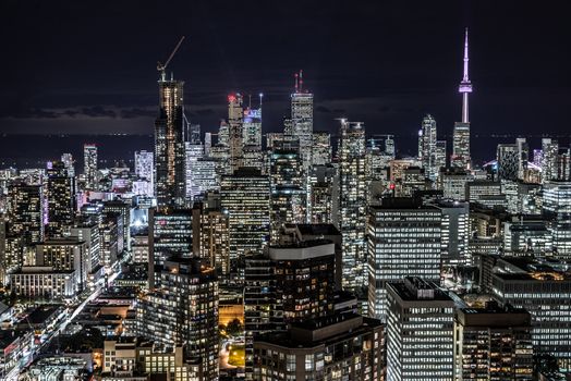 Full view of downtown Toronto at night with glamour lights