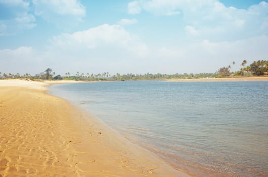 Horizontal photo of the sea lagoon with sandy beach. Colorful photo. Vivid colors